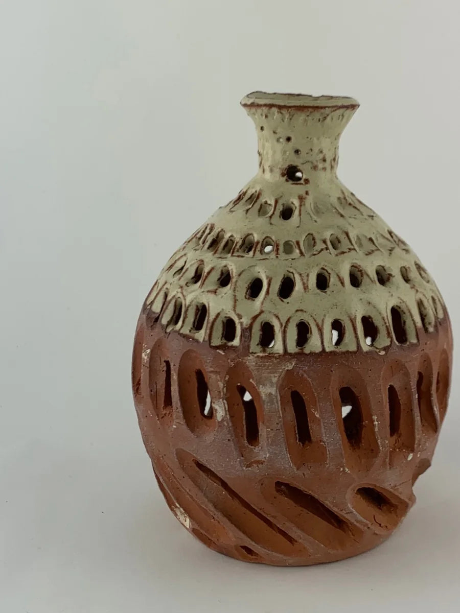 Openwork terracotta and cream ceramic vase